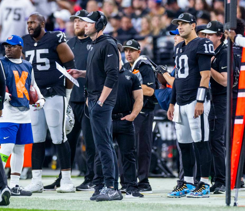 Raiders Offensive Coordinator Bo Hardegree on the sidelines as quarterback Jimmy Garoppolo (10) ...