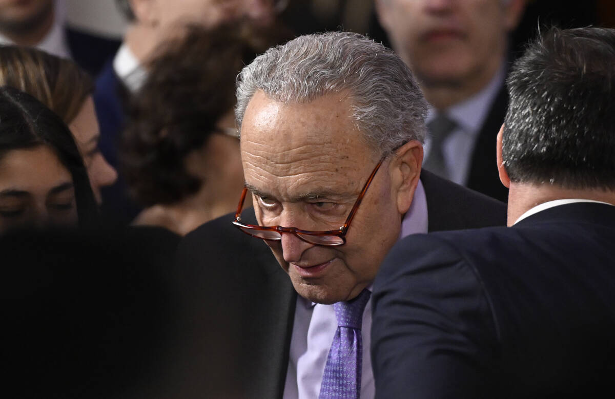 Senate Majority Leader Chuck Schumer of N.Y., arrives before President Joe Biden and first lady ...