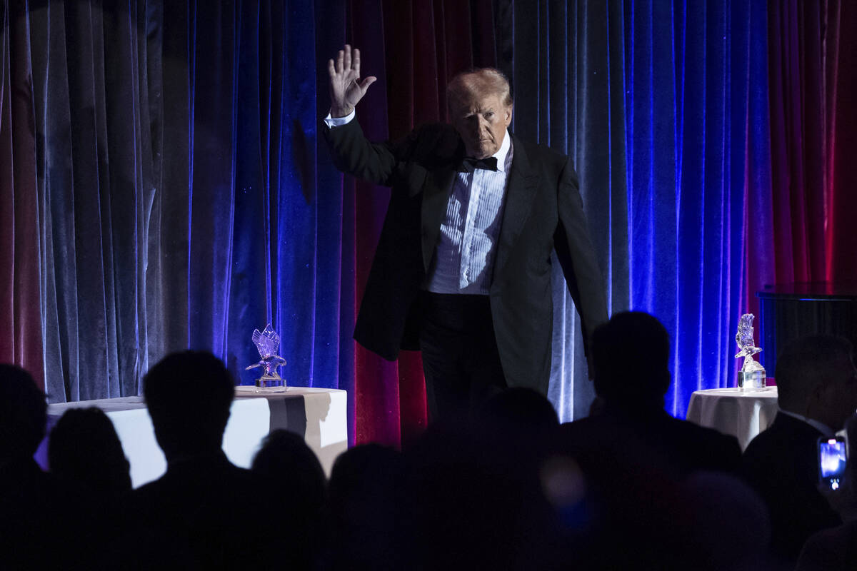 Former President Donald Trump exits the stage during the New York Young Republican Club's annua ...