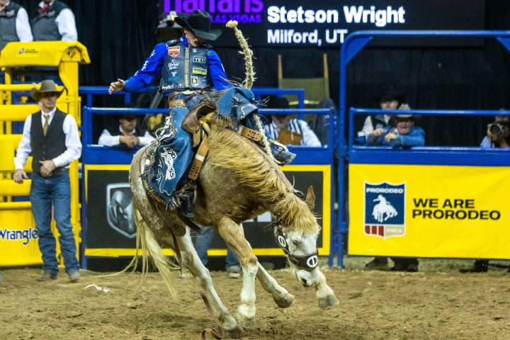 Stetson Wright of Milford, Utah, dominates on his ride in Saddle Bronc Riding during the Nation ...