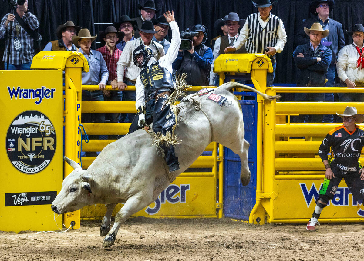 Sage Kimzey takes first place in Bull Riding during day 5 action of the NFR at the Thomas & Mac ...