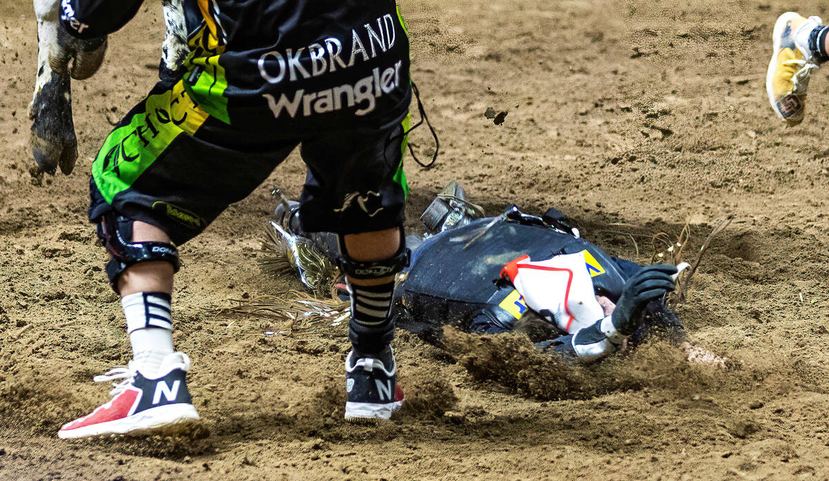 Ky Hamilton lands hard in the dirt after being thrown during Bull Riding during day 5 action of ...