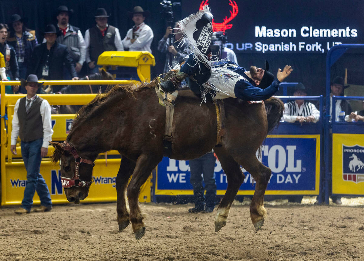 Mason Clements takes first place in Bareback riding during day 5 action of the NFR at the Thoma ...