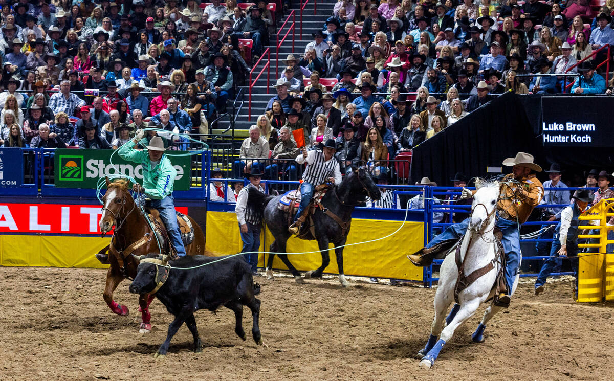 Header Luke Brown and Heeler Hunter Koch take first place in Team Roping during day 5 action of ...