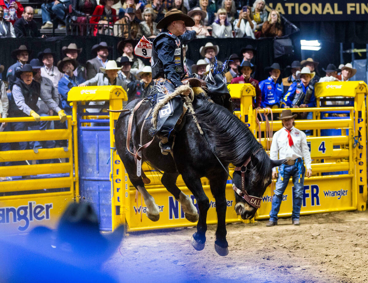 Zeke Thurston takes first place in Saddle Bronc Riding during day 5 action of the NFR at the Th ...