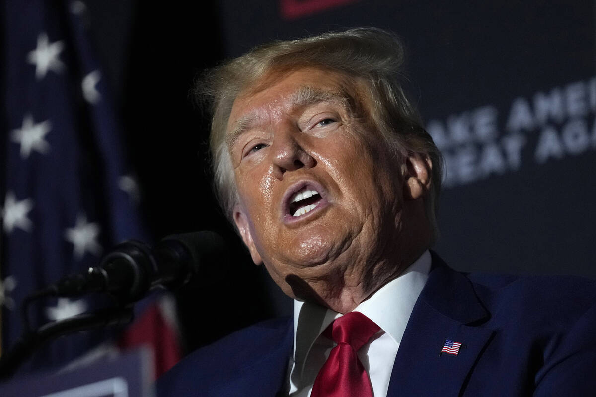 Former President Donald Trump speaks at a campaign rally, Tuesday Aug. 8, 2023, at Windham High ...