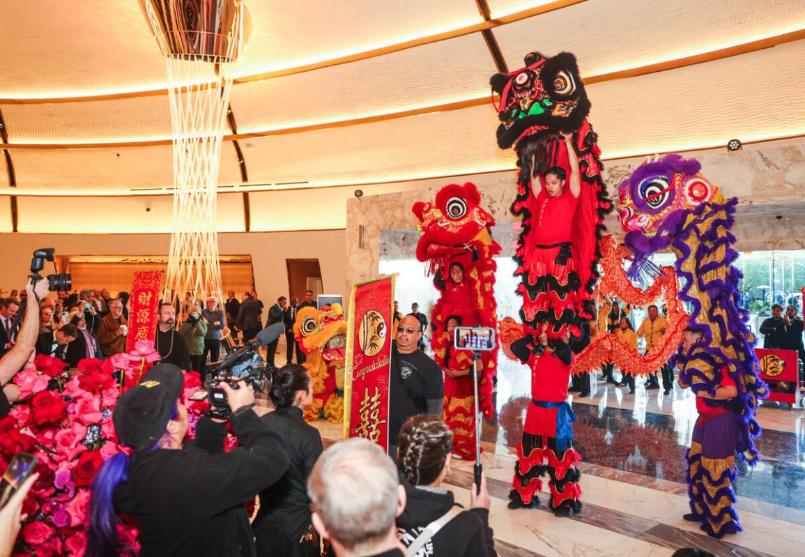 Members of the Lohan School of Shaolin lion dance troupe perform for the opening ceremony of Fo ...