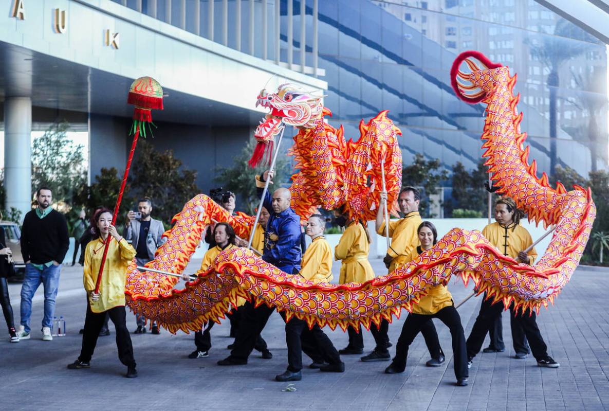 Members of the Lohan School of Shaolin lion dance troupe perform for the opening ceremony of Fo ...