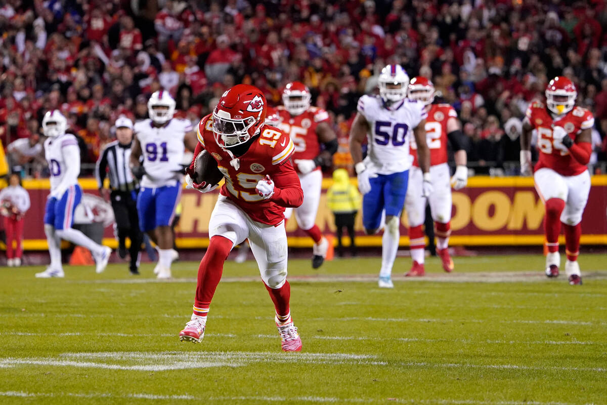 Kansas City Chiefs wide receiver Kadarius Toney runs to the end zone after catching a lateral b ...