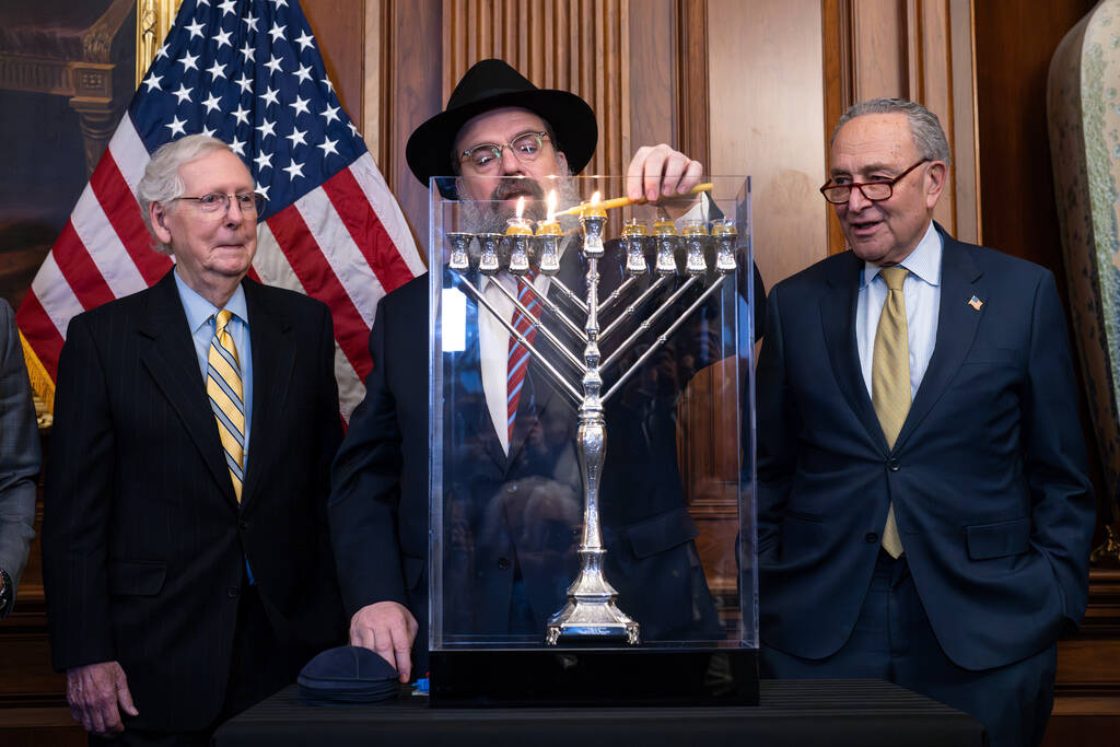 From left, Senate Minority Leader Mitch McConnell, R-Ky., Rabbi Levi Shemtov, and Senate Majori ...