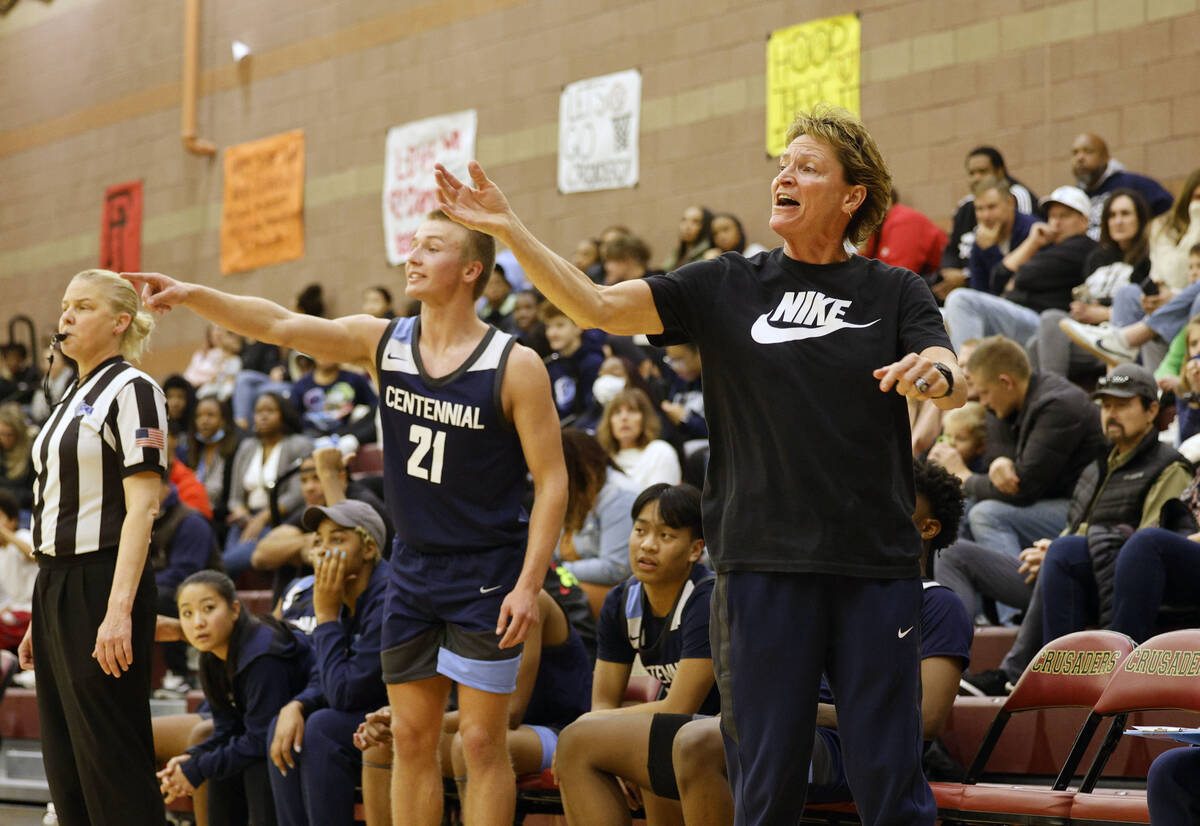 Centennial's head coach Karen Weitz, and Centennial's Kohlman Smith (21) gestures during the fi ...