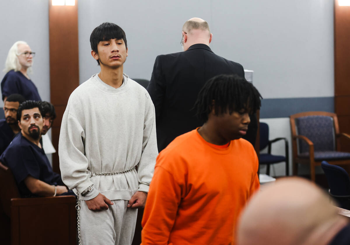 Damien Hernandez, 17, center, and Gianna Robinson, 17, two of the four teens arrested in connec ...
