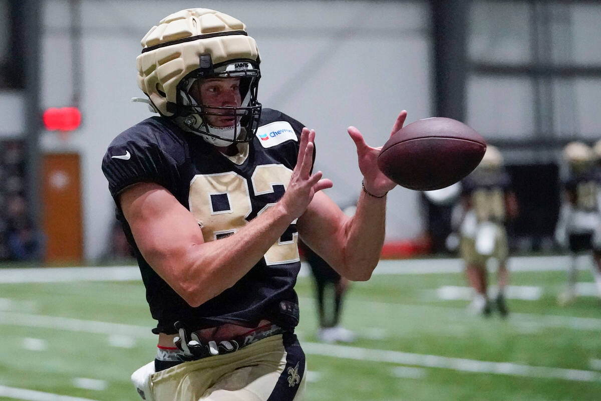 New Orleans Saints tight end Foster Moreau (82) runs through drills at the NFL team's football ...