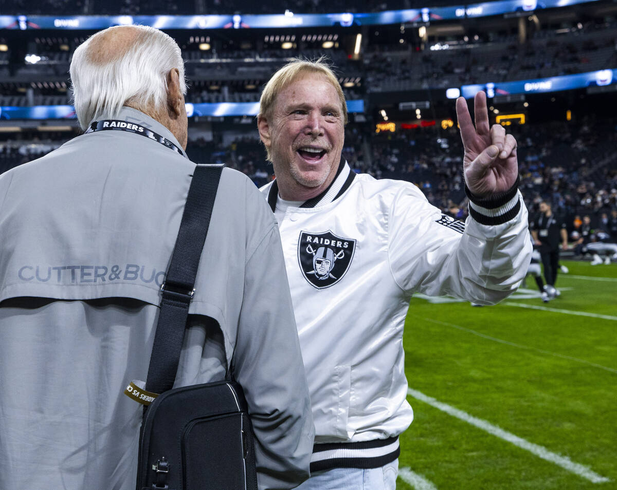 Raiders owner Mark Davis greets fans on the sidelines during warmups before the first half of t ...