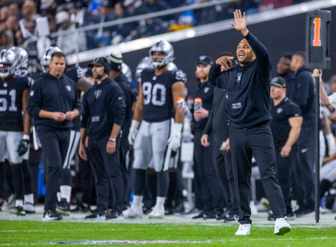 Raiders interim head coach Antonio Pierce argues a penalty for the Los Angeles Chargers during ...