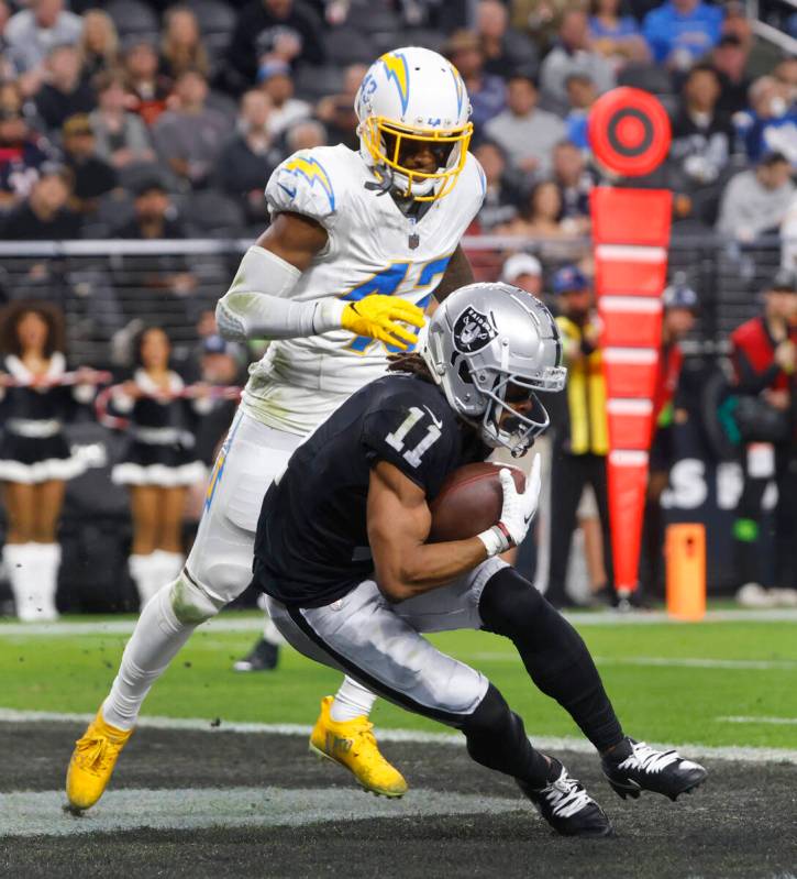 Raiders wide receiver Tre Tucker (11) scores his second touchdown in front of Los Angeles Charg ...