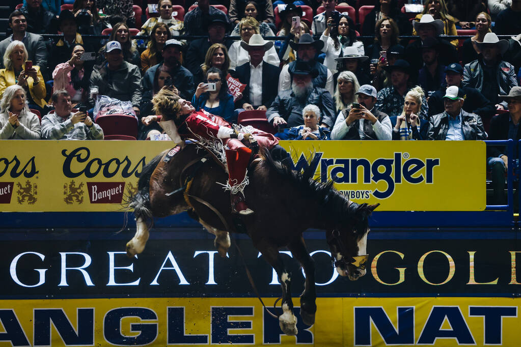 Rocker Steiner gets bucked near the crowd during the National Finals Rodeo at the Thomas & ...