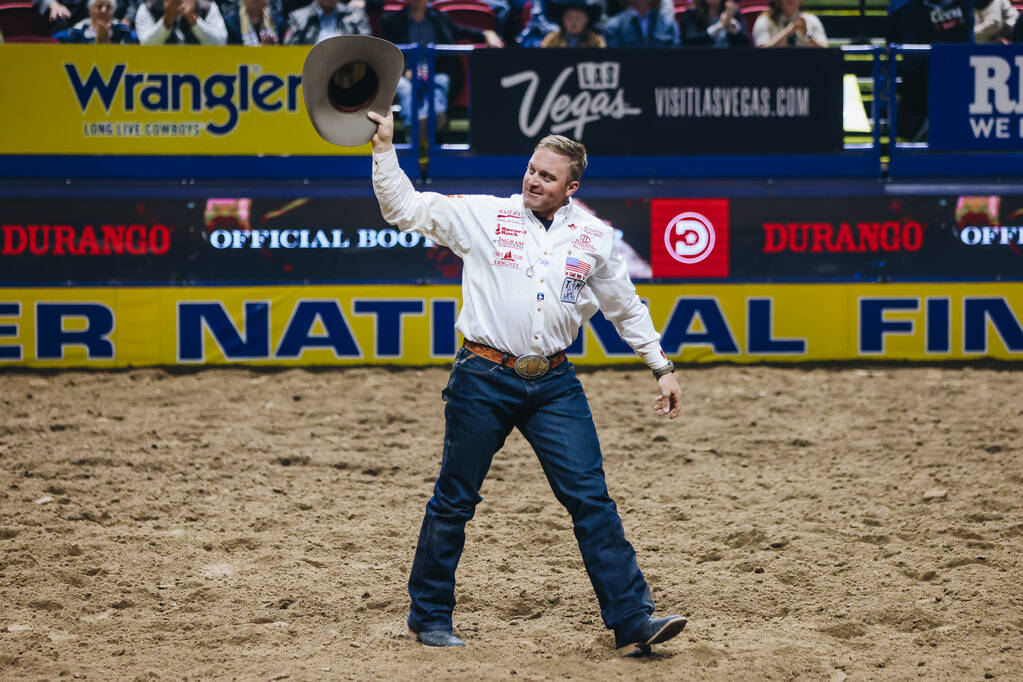 Dakota Eldridge gestures to the crowd during the National Finals Rodeo at the Thomas & Mack ...