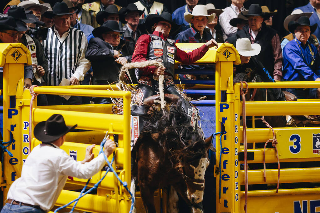 Wyatt Casper bucks out of the chute on the horse during the National Finals Rodeo at the Thomas ...