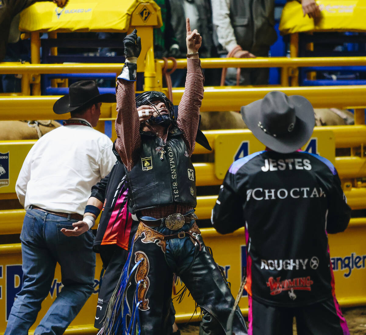 Hayes Weight celebrates his ride during the National Finals Rodeo at the Thomas & Mack Cent ...