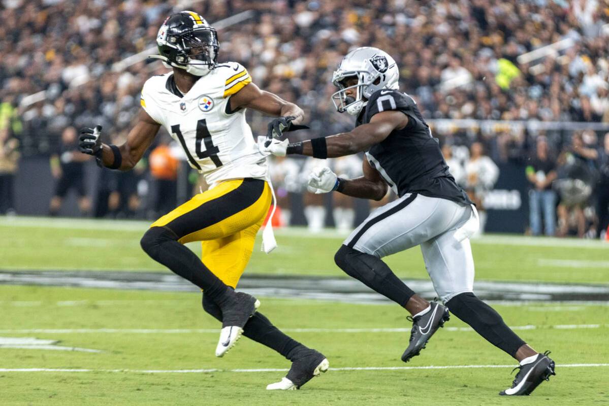 Raiders cornerback Jakorian Bennett (0) defends as Pittsburgh Steelers wide receiver George Pic ...