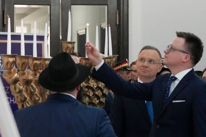 President Andrzej Duda, second right, Speaker of the Polish Parliament Szymon Holownia, right, ...