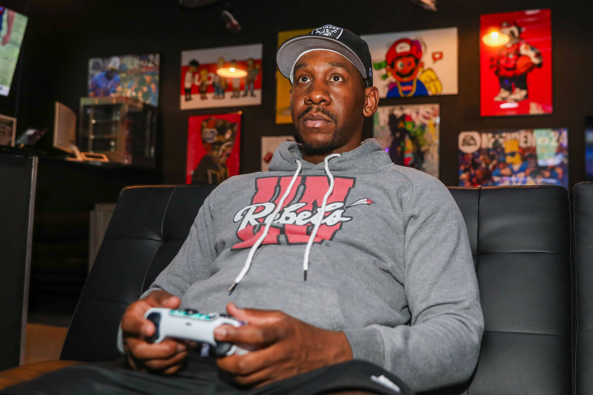 Trey Turley, owner of The Gamerz Garage, hangs out at his video game lounge on Thursday, Dec. 7 ...