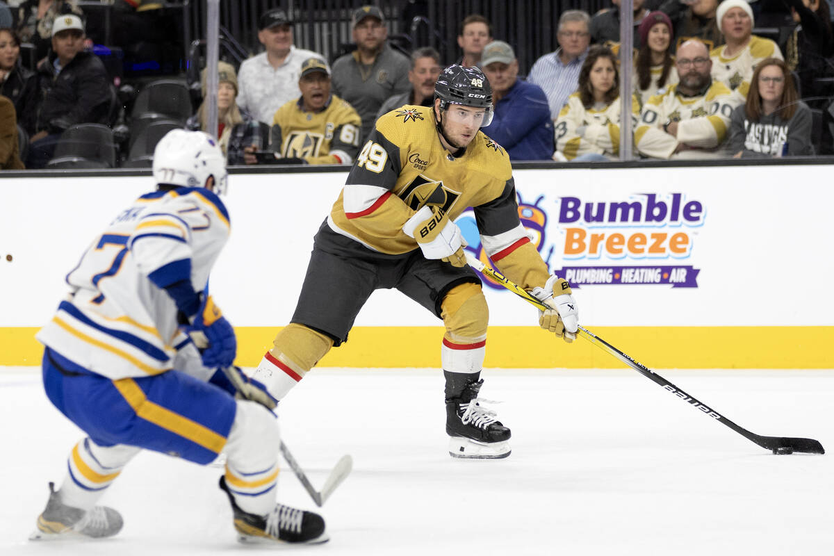 Golden Knights center Ivan Barbashev (49) winds up to take a shot on goal against Sabres right ...