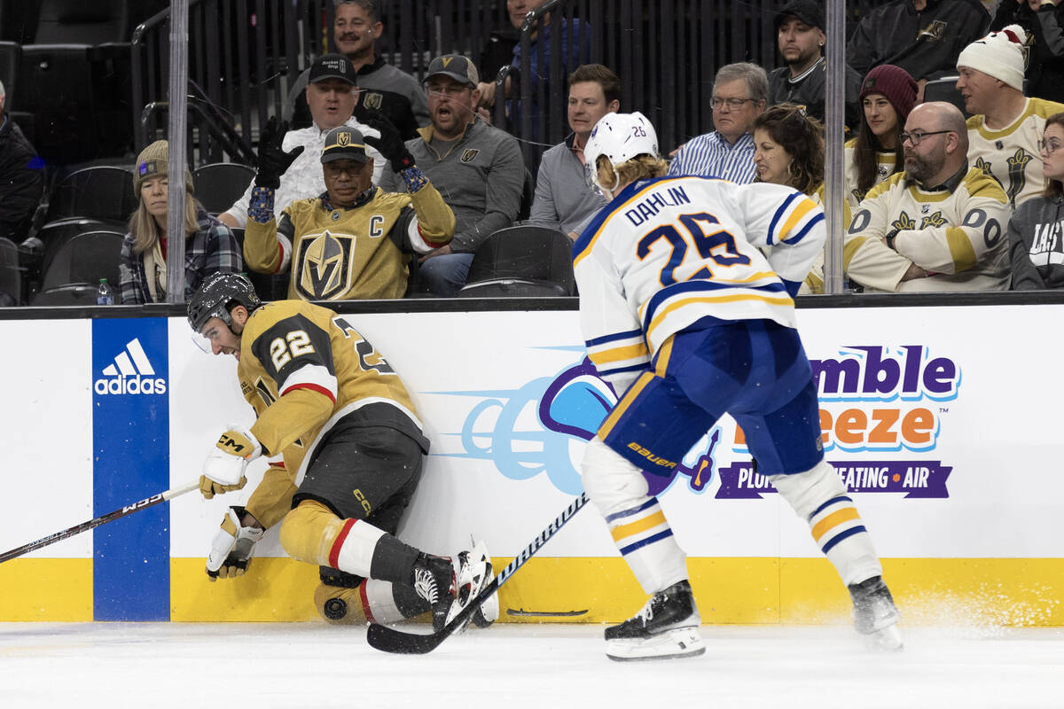 Golden Knights right wing Michael Amadio (22) loses his skate blade while battling for the puck ...