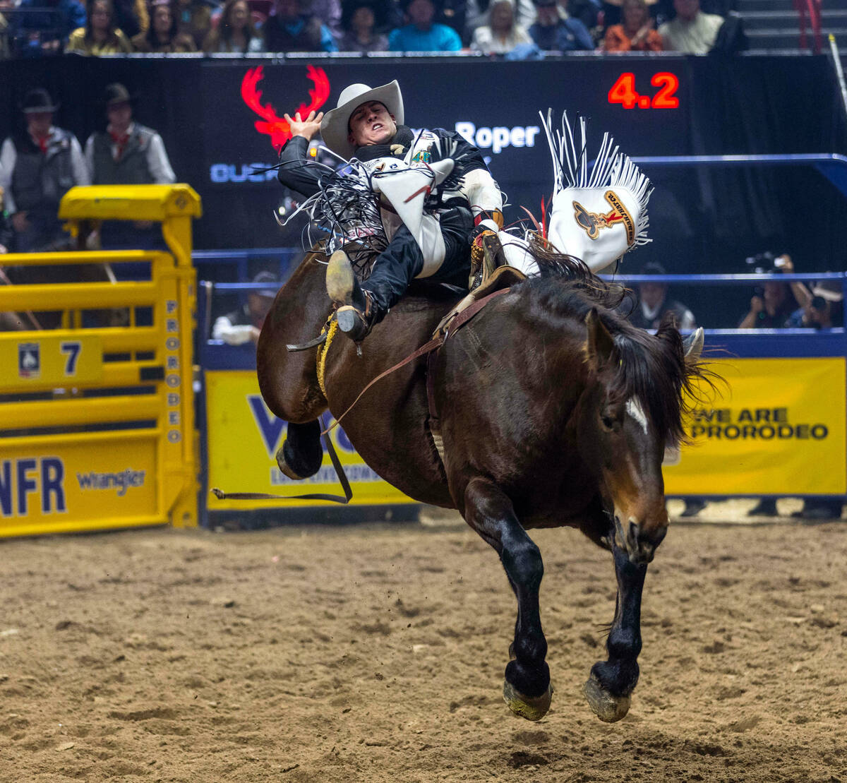 Jayco Roper rides Renovo Night Gazer in Bareback Riding during the final day action of the NFR ...