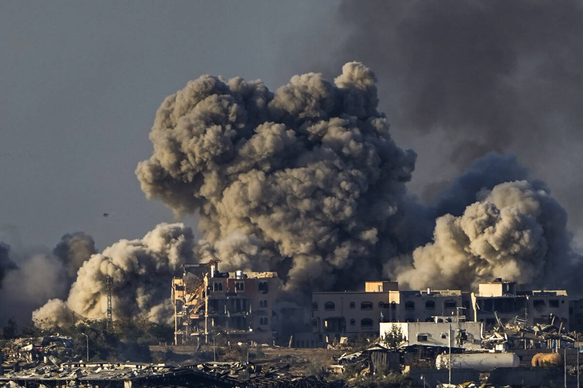 Smoke rises following an Israeli bombardment in the Gaza Strip, as seen from southern Israel, S ...