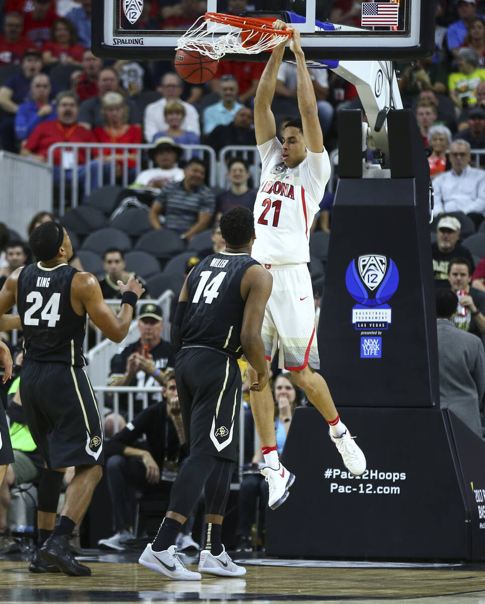 Arizona center Chance Comanche (21) against Colorado during the Pac-12 Conference basketball to ...