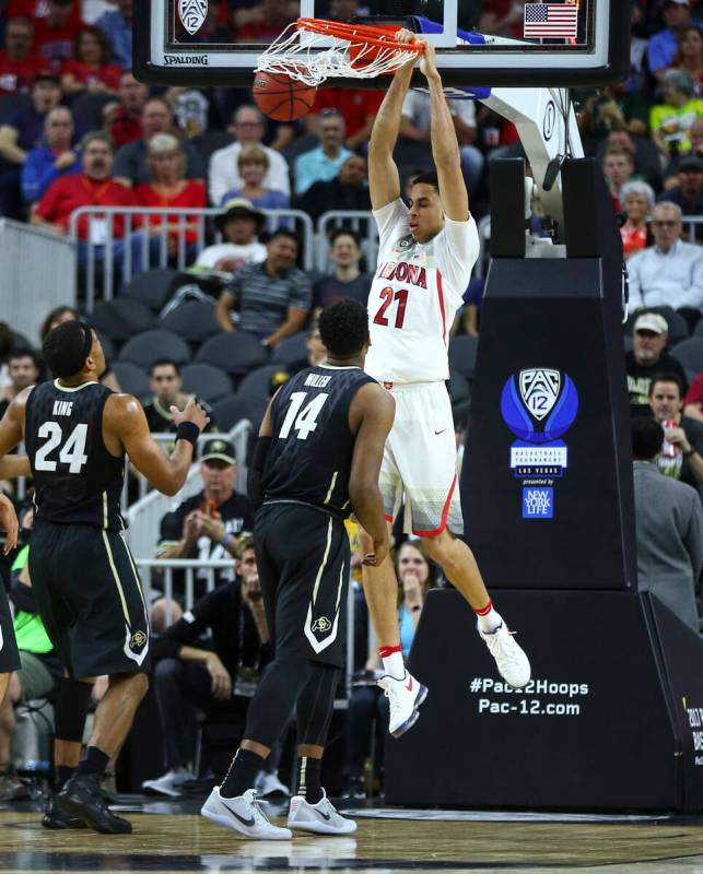 Arizona center Chance Comanche (21) against Colorado during the Pac-12 Conference basketball to ...