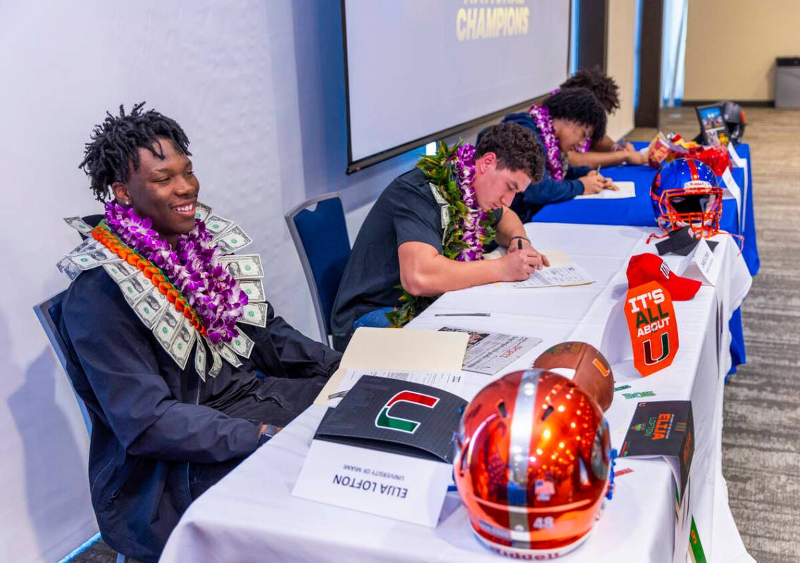 Bishop Gorman players Elija Lofton, Charles Correa, Micah Kaapana and Alijah Carnell with their ...