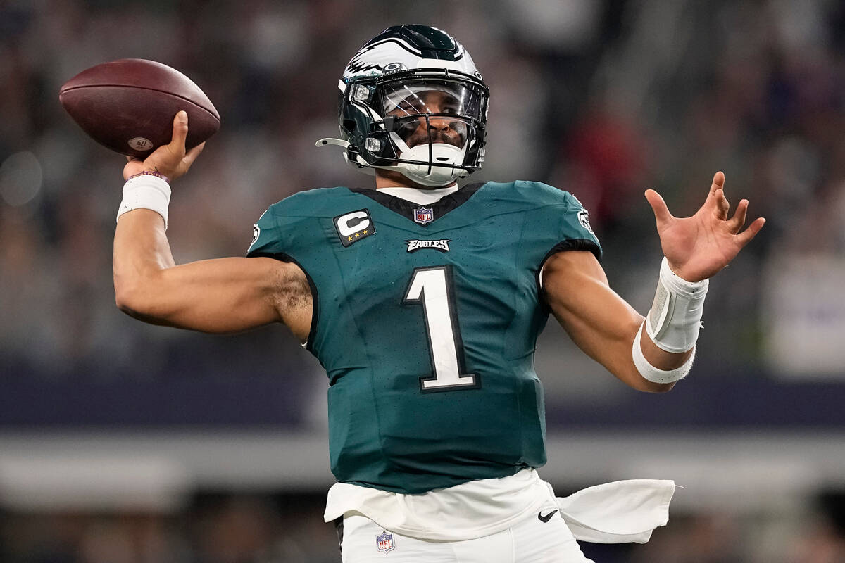 Philadelphia Eagles quarterback Jalen Hurts throws during the second half of an NFL football ga ...