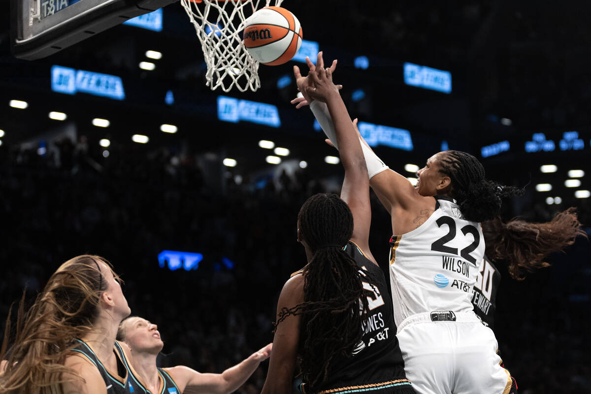 Las Vegas Aces forward A'ja Wilson (22) shoots against New York Liberty forward Jonquel Jones ( ...