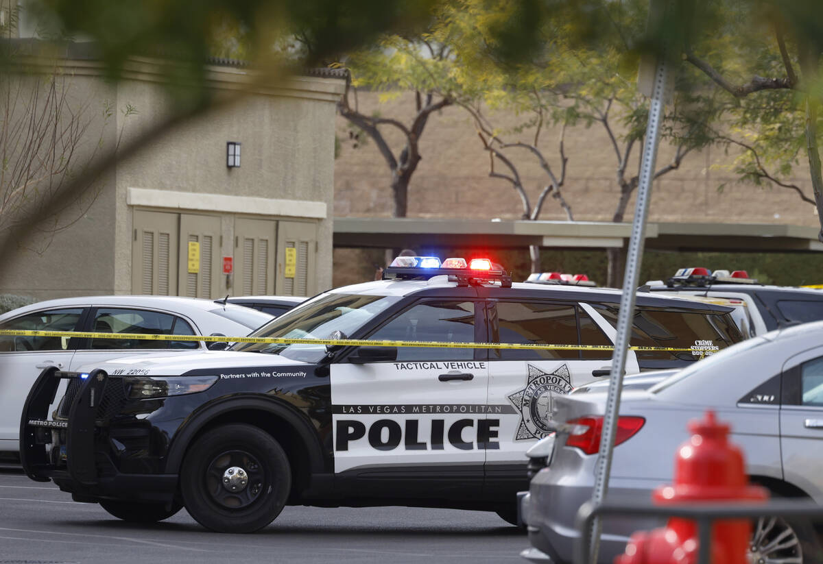 Las Vegas police investigate after four people were found dead in a shooting at a northwest val ...