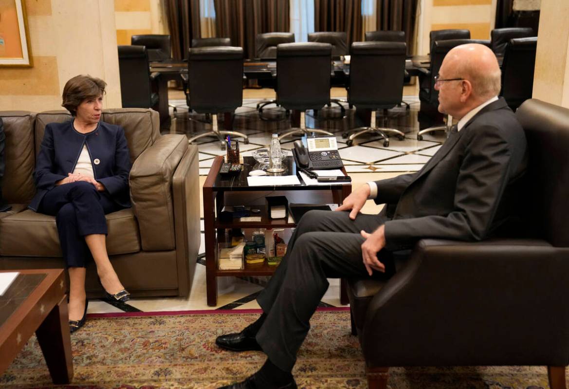 French Foreign Minister Catherine Colonna, left, meets with Lebanese caretaker Prime Minister N ...