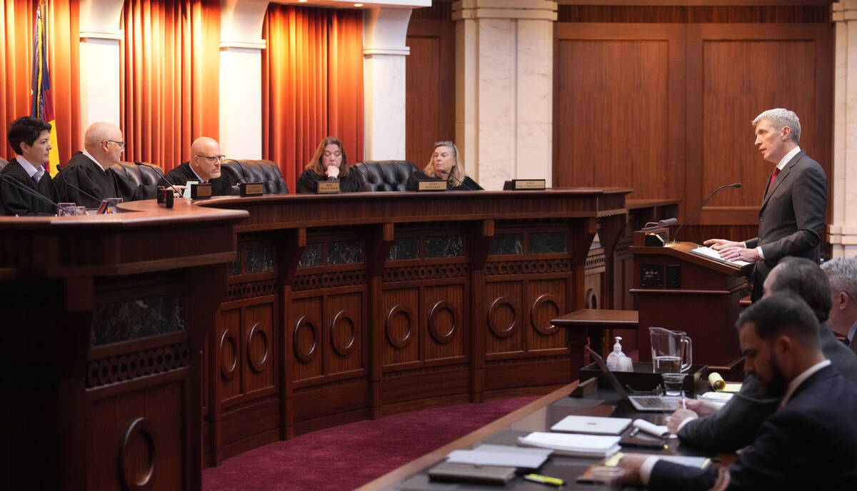 Attorney Eric Olson, far right, argues before the Colorado Supreme Court on Wednesday, Dec. 6, ...