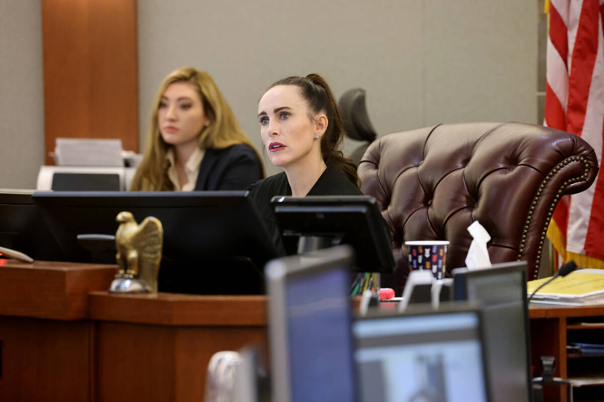 Clark County District Court Judge Jacqueline Bluth listens to arguments during a court hearing ...