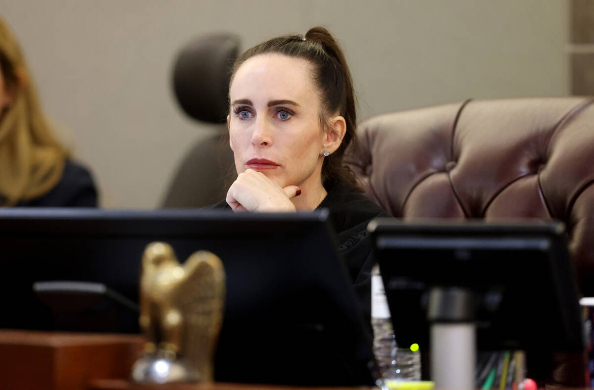 Clark County District Court Judge Jacqueline Bluth listens to arguments during a court hearing ...