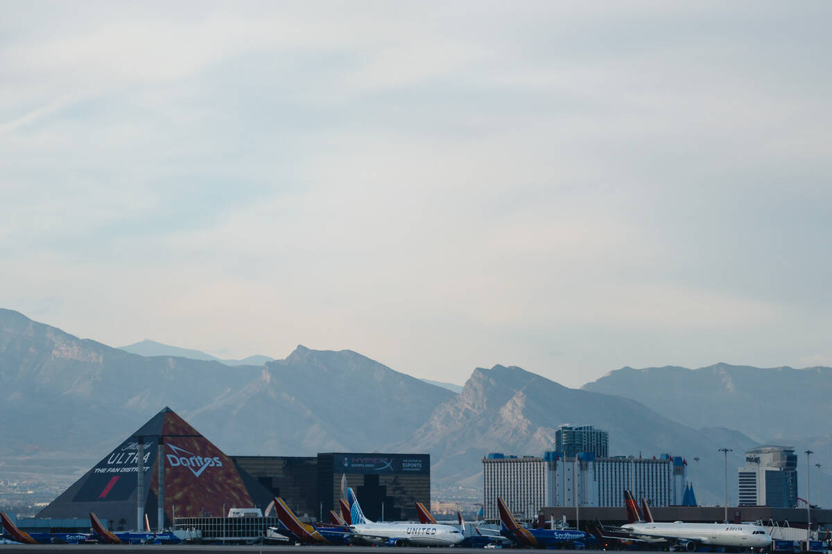 Airplanes sit parked at Harry Reid International Airport on Wednesday, Dec. 20, 2023, in Las Ve ...