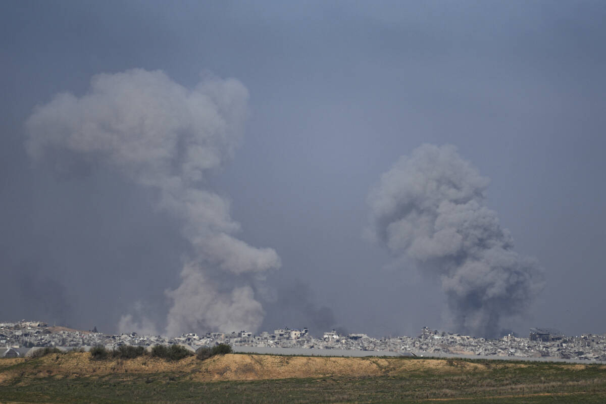 Smoke rises following an Israeli bombardment in the Gaza Strip, as seen from southern Israel, W ...