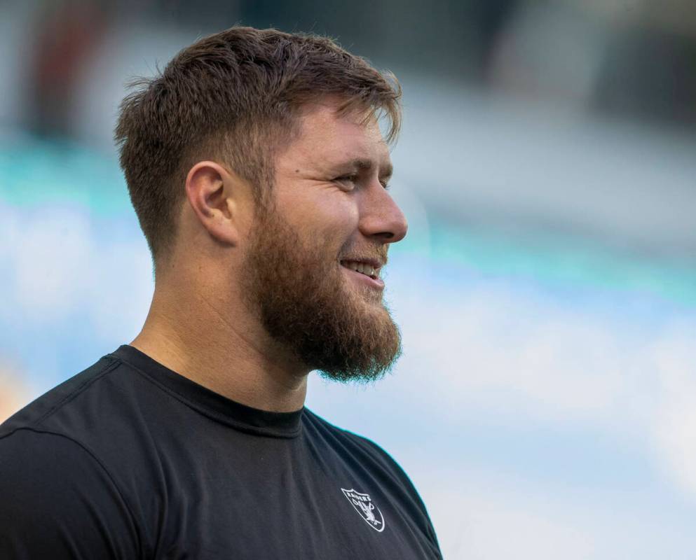 Raiders offensive tackle Kolton Miller on the field before an NFL game against the Miami Dolphi ...