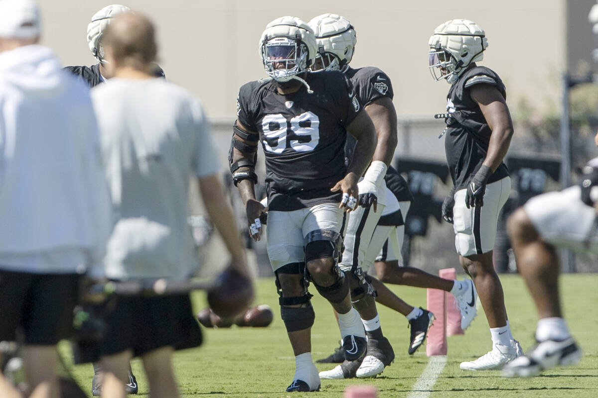 Raiders defensive tackle Nesta Jade Silvera (99) stretches during the team’s practice at ...