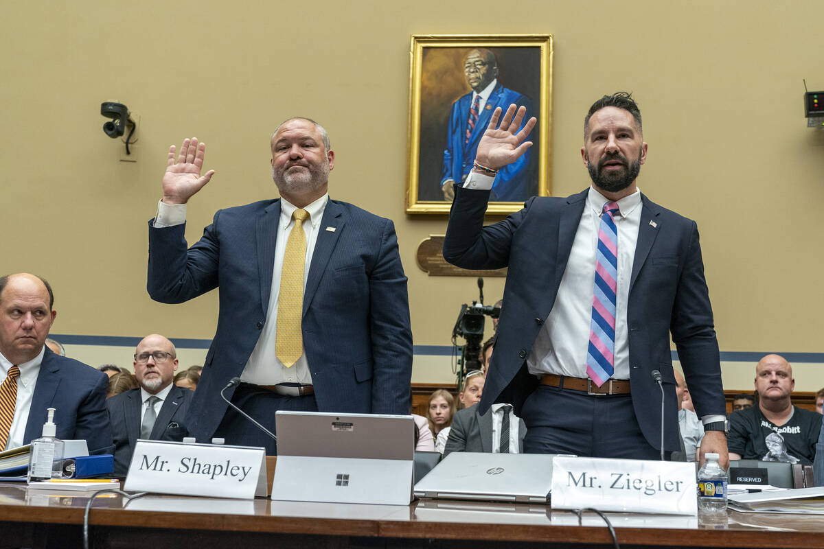 IRS Supervisory Special Agent Gary Shapley, left, and IRS Criminal Investigator Joseph Ziegler, ...