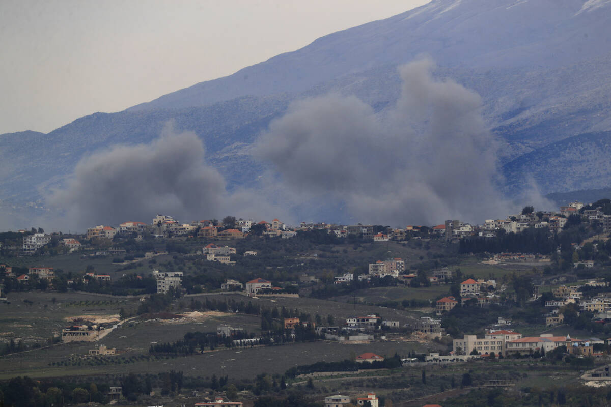 Smoke rises after Israeli air strikes on the outskirts of Khiam, a town near the Lebanese-Israe ...