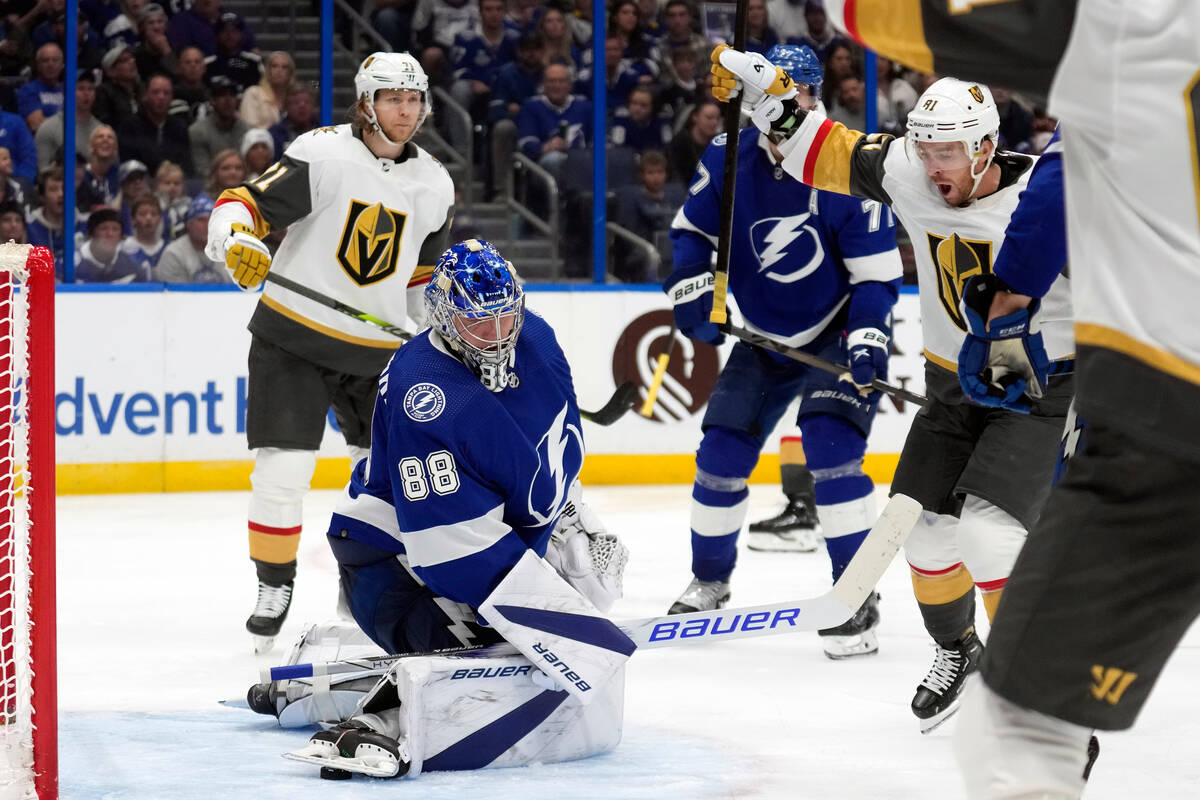 Vegas Golden Knights right wing Jonathan Marchessault (81) celebrates after scoring past Tampa ...