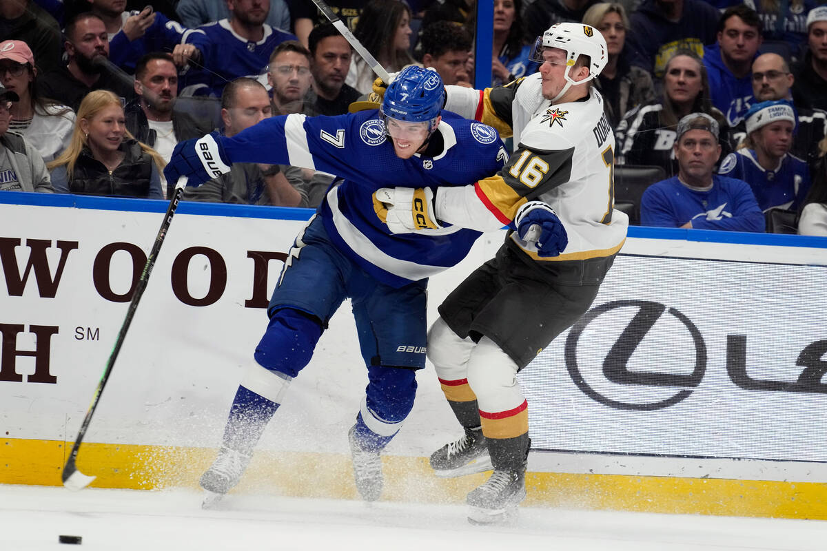 Tampa Bay Lightning defenseman Haydn Fleury (7) and Vegas Golden Knights left wing Pavel Dorofe ...