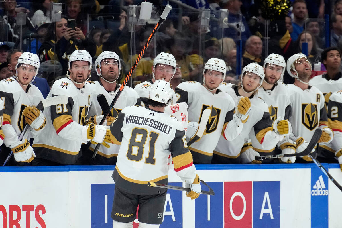 Vegas Golden Knights right wing Jonathan Marchessault (81) celebrates with the bench after his ...